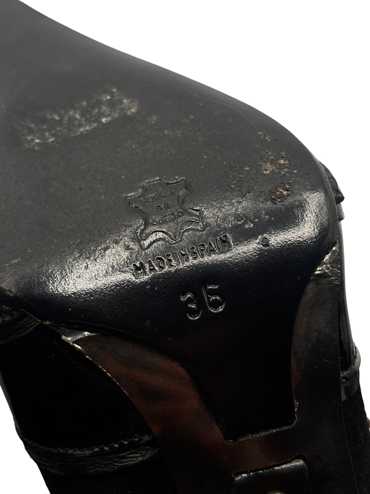 Black boot heel with molded “Made in SPAIN” marking