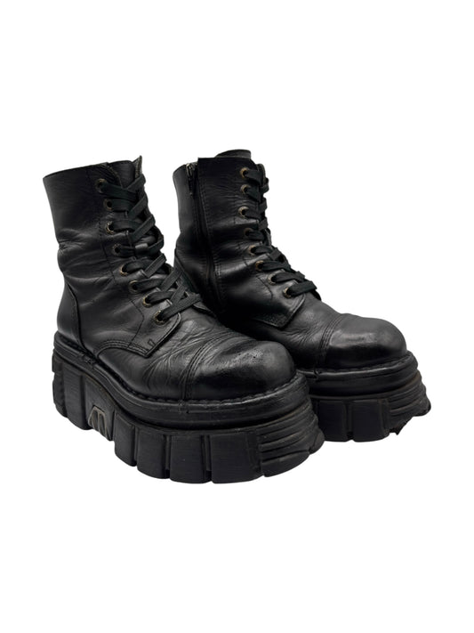 Black leather lace-up platform boots with chunky lug sole