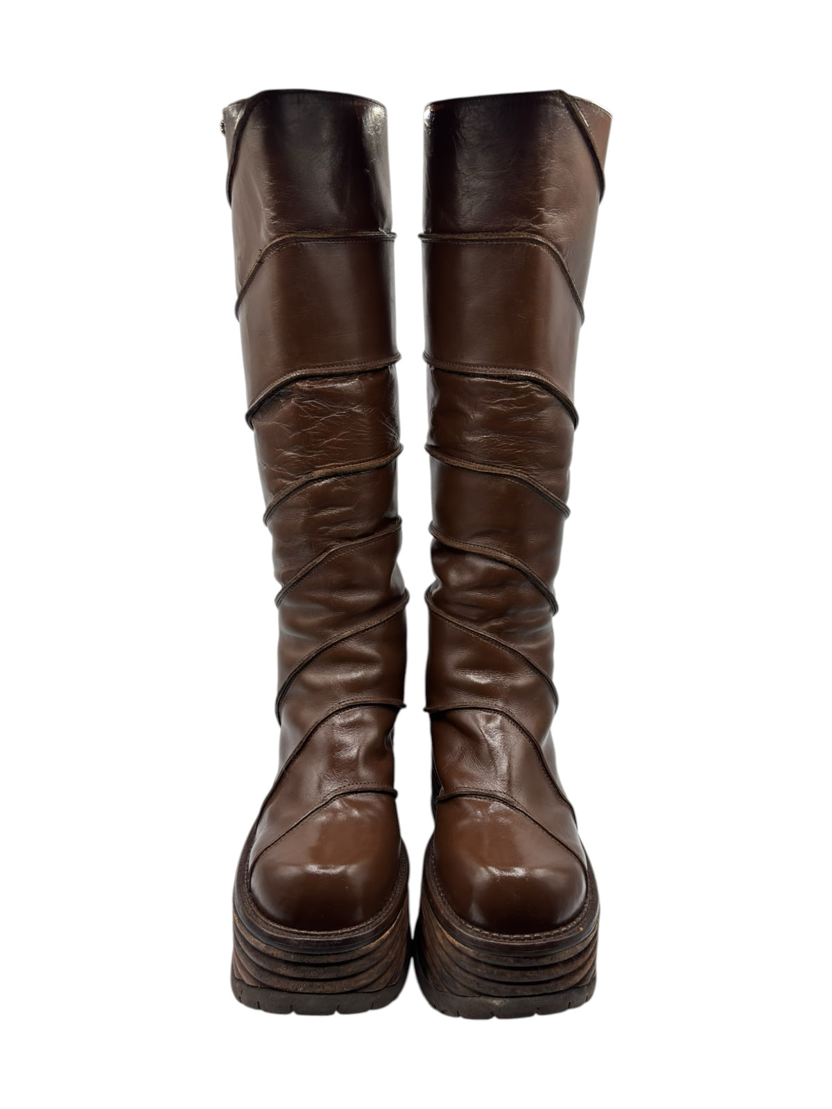 Brown knee-high platform boots with block heel and folded upper detail