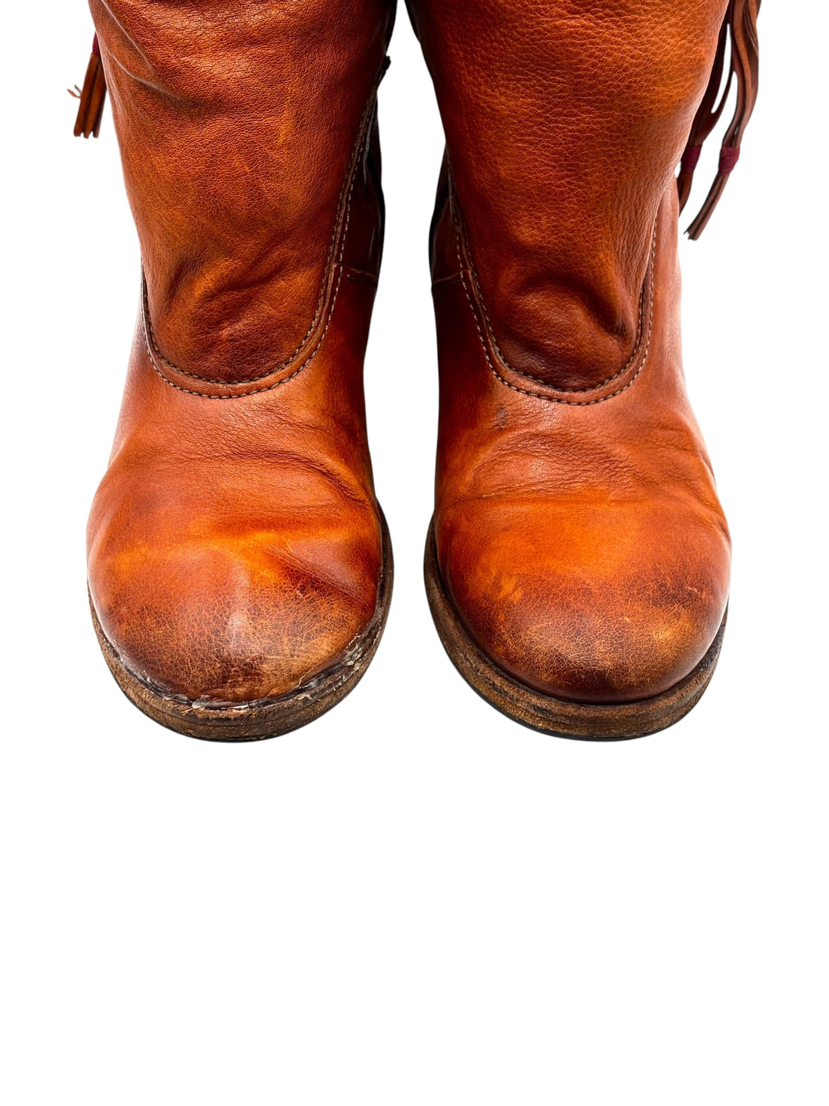Leather mid-calf boots front view with rounded toes and distressed finish