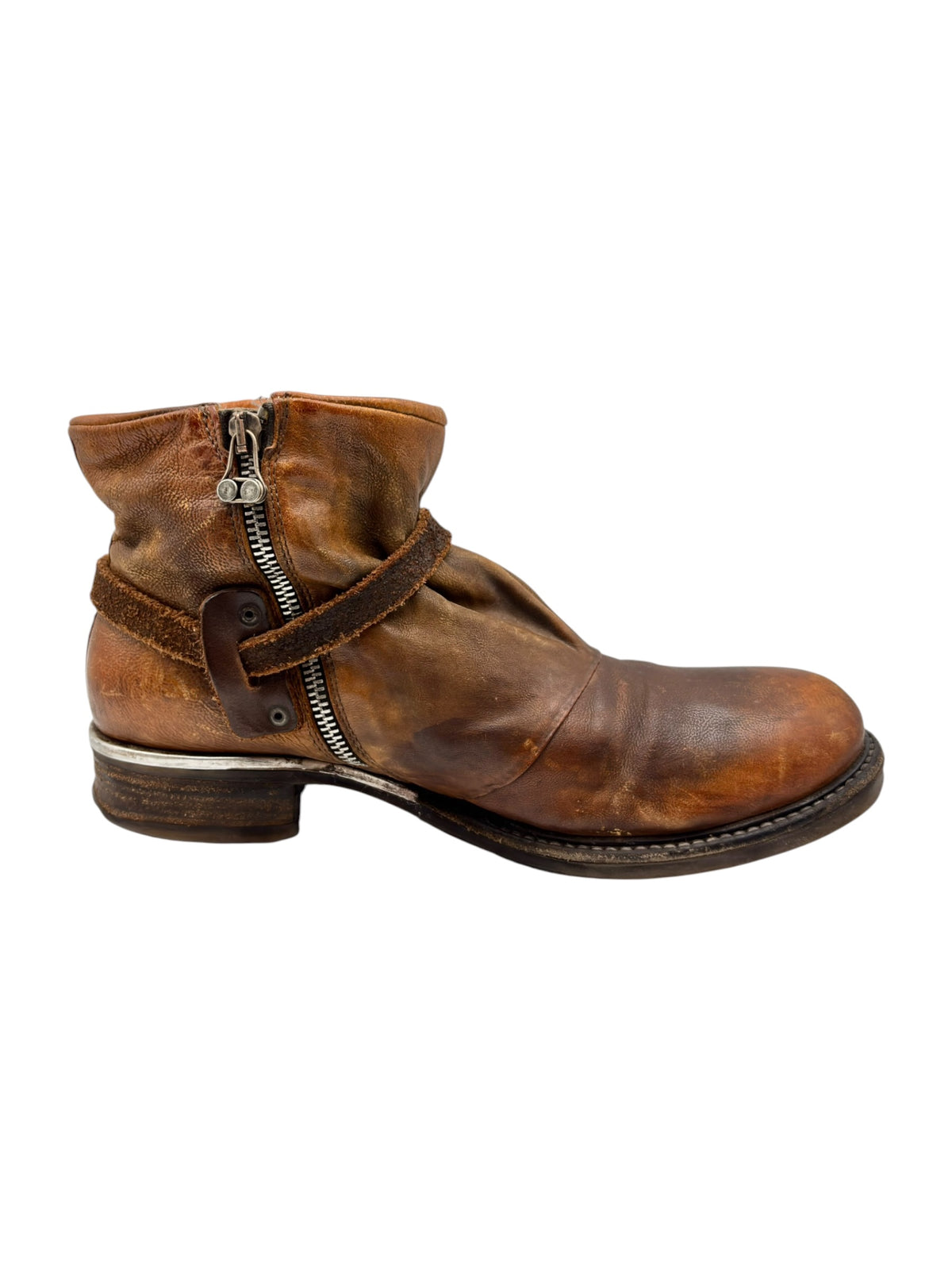 Brown leather ankle boots with high cuff, side zipper, and stitched leather upper