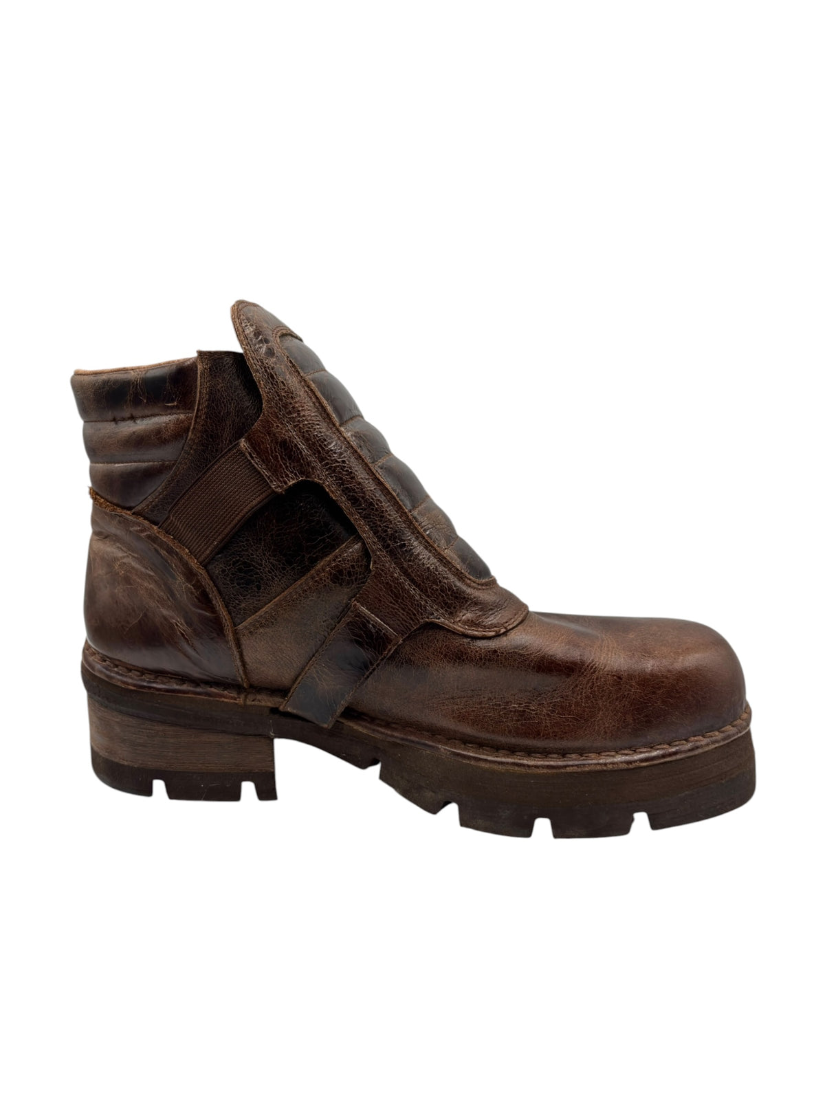Brown leather lace-up style ankle boot with buckle strap and rugged sole