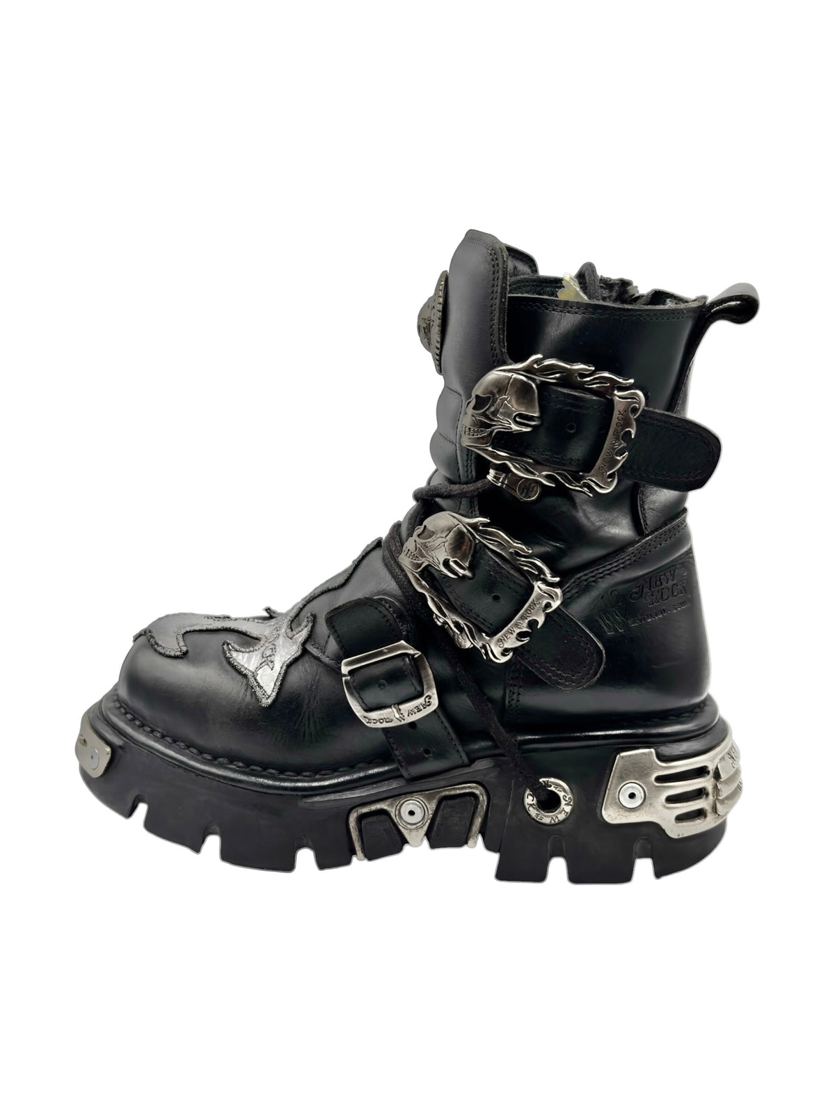 Black combat boots with buckles, straps, and silver-tone hardware