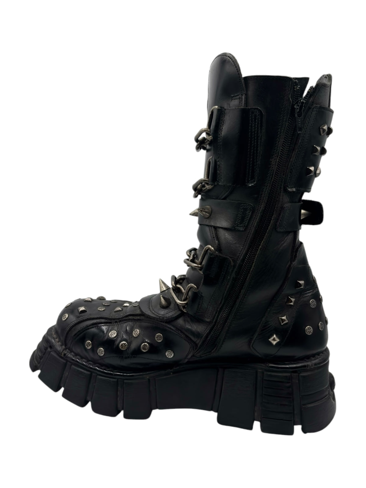 Studded chain platform boots in black, side view with buckles, studs, and chunky platform sole