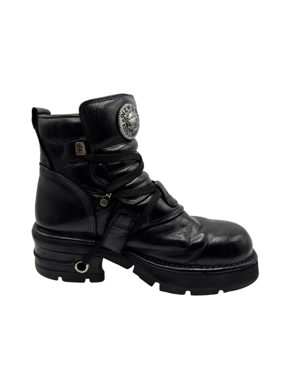 Black vintage raised-heel leather ankle boots with buckle strap detail