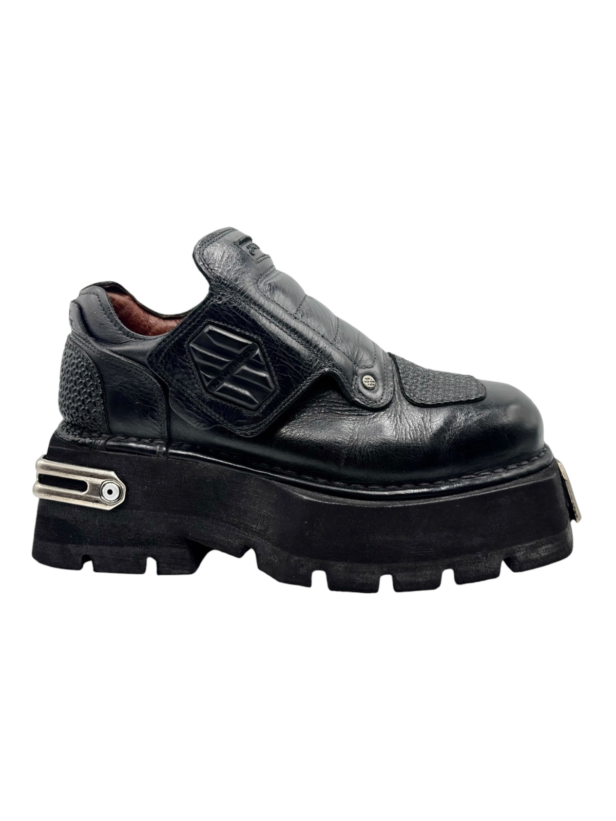 Vintage New Rock platform boots: black slip-on with embossed logo panel and metal buckle