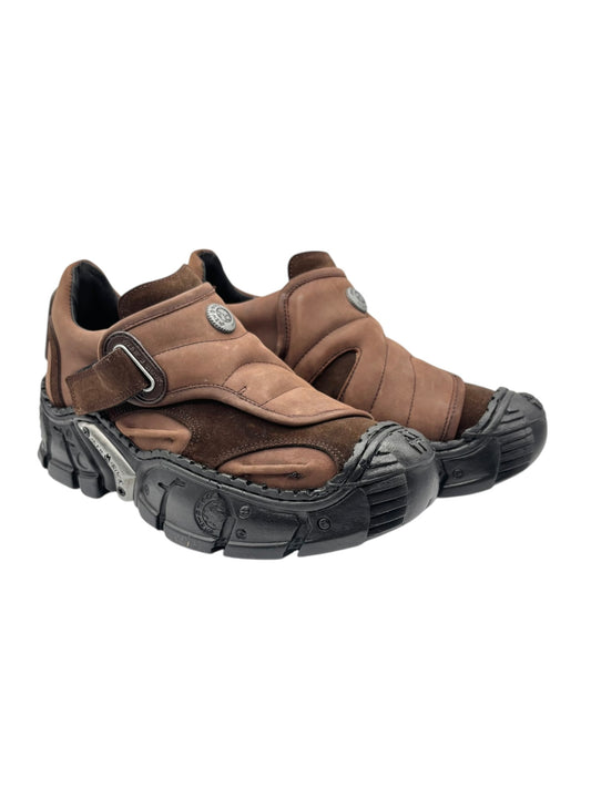 Brown leather sneakers with dual straps and chunky dark rubber sole, low profile.