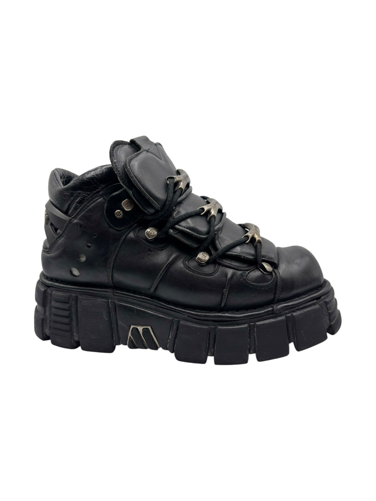 Black leather-look platform boots with double-buckle strap detail and thick tread sole