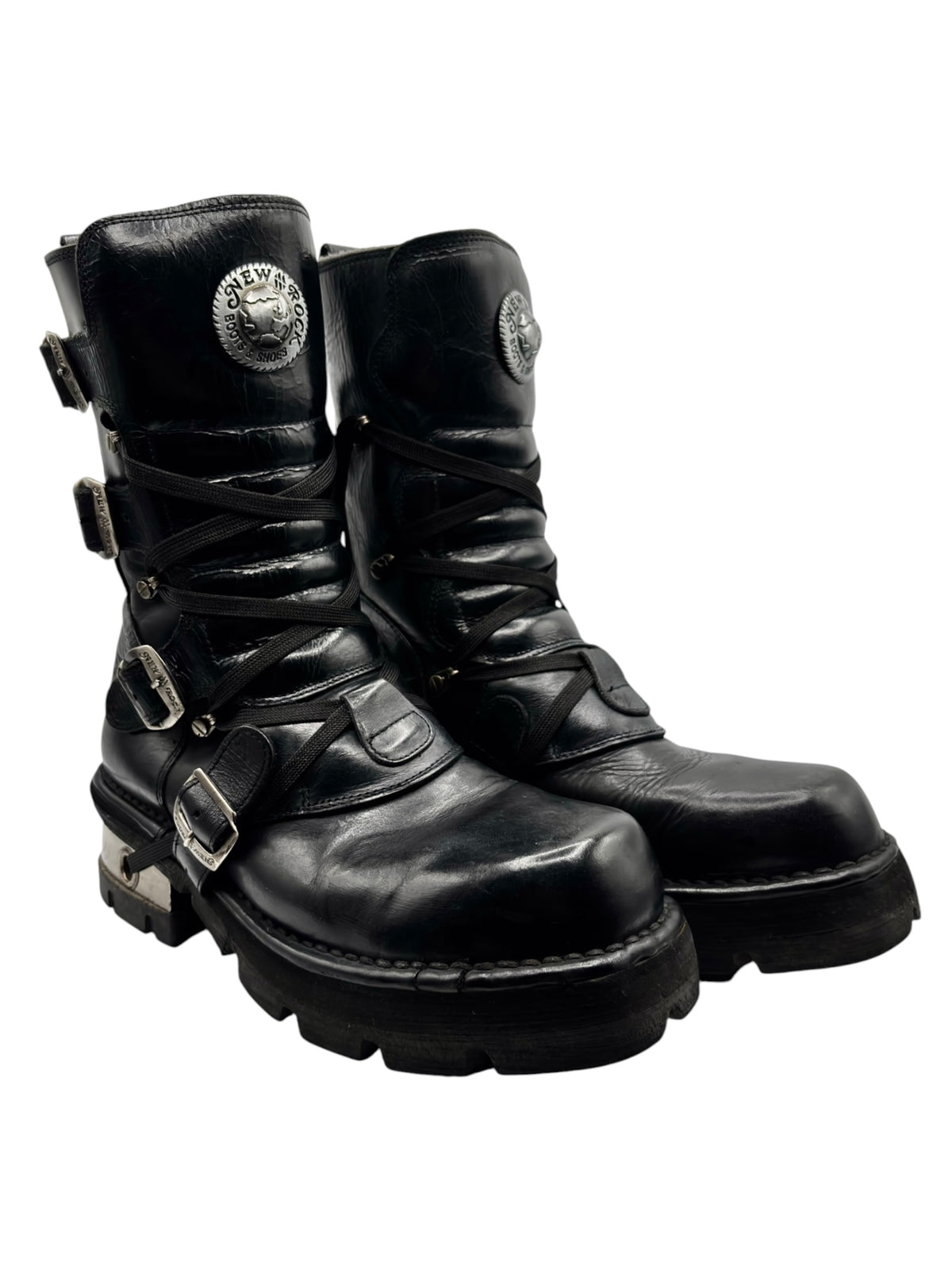 Black lace-up platform ankle boots with chunky sole, toe cap, and side strap buckles