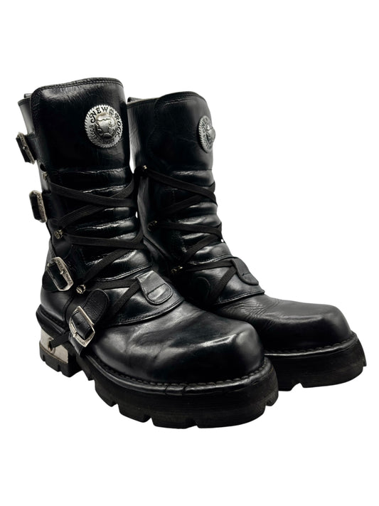 Black lace-up platform ankle boots with chunky sole, toe cap, and side strap buckles