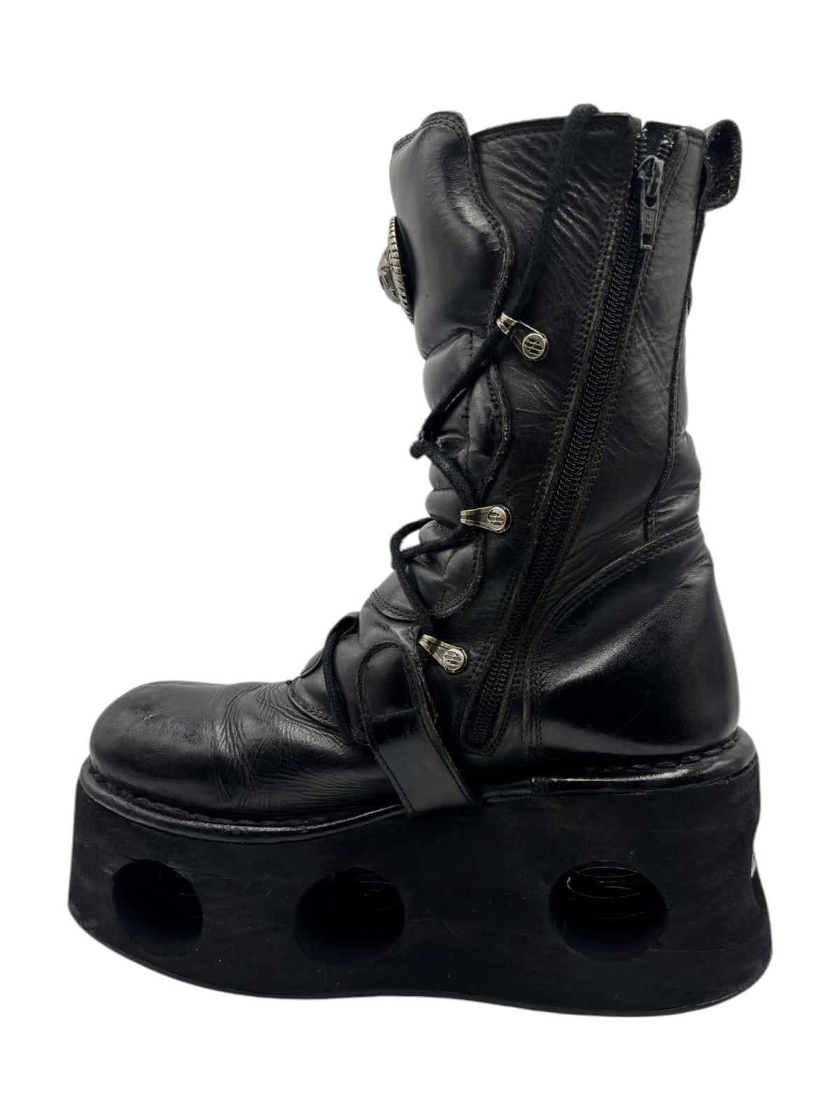 Black mid-calf platform boot with laces, side zipper, and buckle strap