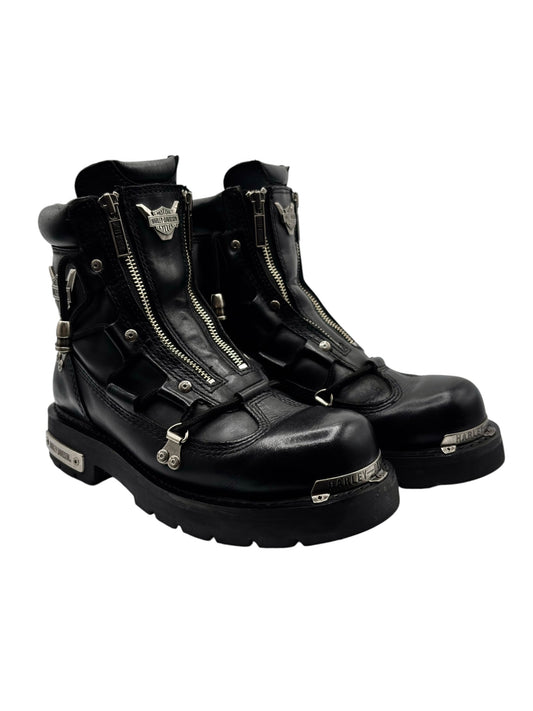 Black leather biker boots with double zippers, buckles, and studded side accents