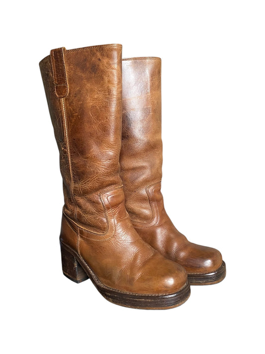Brown leather tall boots with block heel and side pull tab, distressed upper