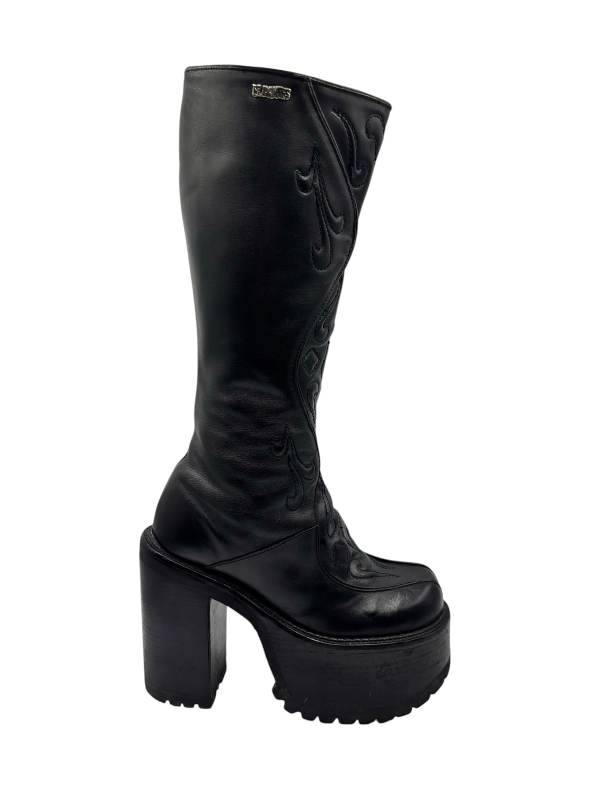 Black knee-high leather platform boots, side profile with sculpted platform sole