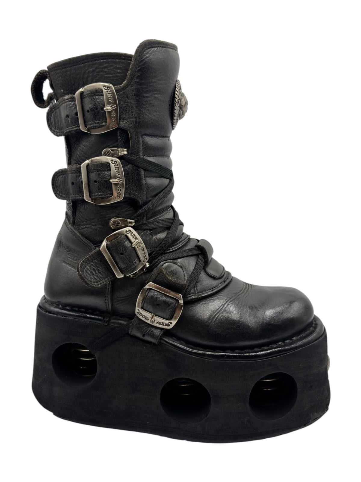 Black platform boots with lace-up front and three visible buckle strap details