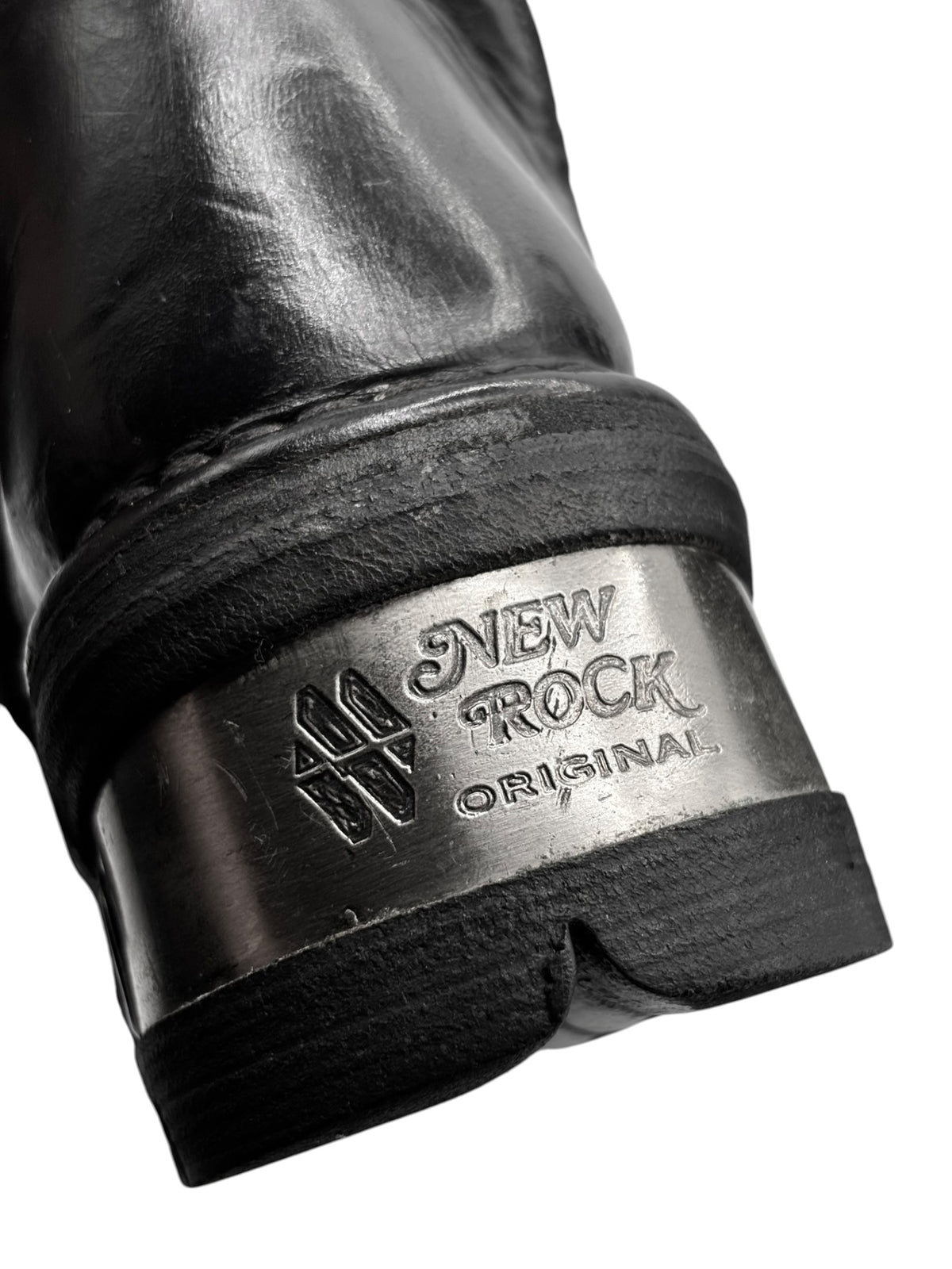 New Rock boot heel with embossed New Rock Original logo label