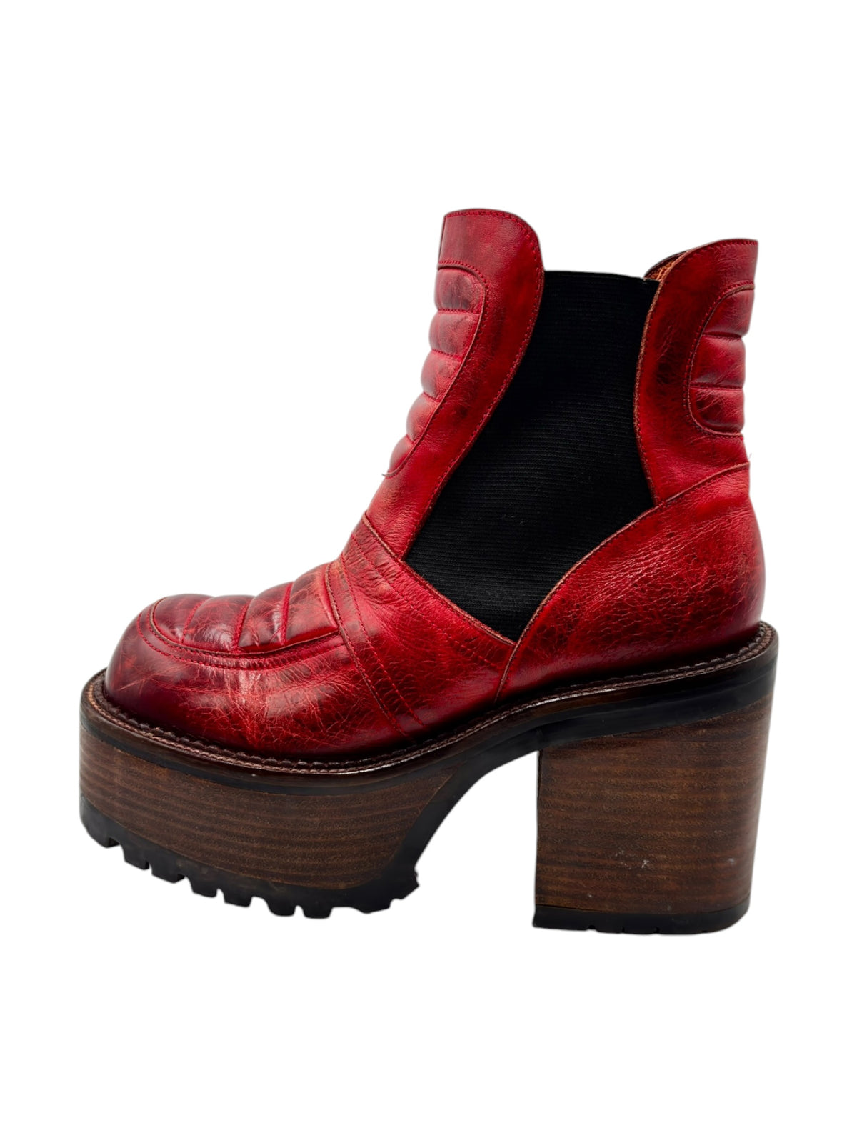 Red leather ankle boots with black elastic inserts and chunky wooden block heel