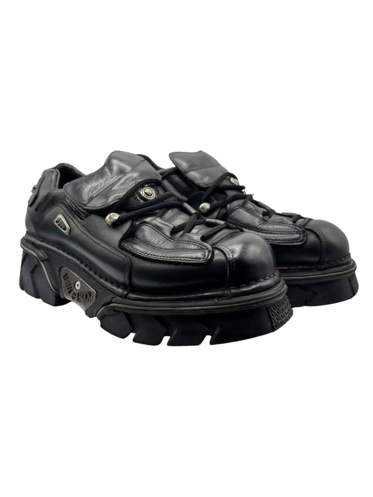 Black leather platform lace-up boots, side view with metal eyelets and thick sole