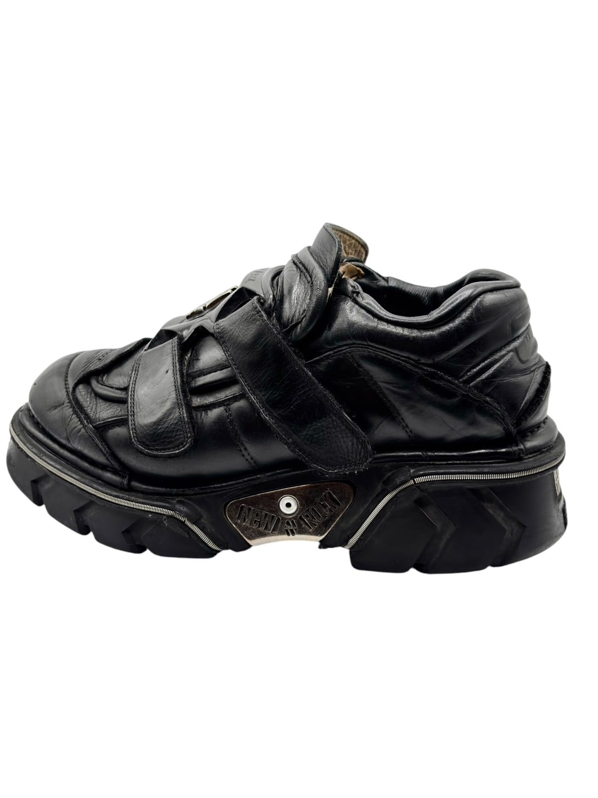 Black leather platform boots with double straps and thick lug sole