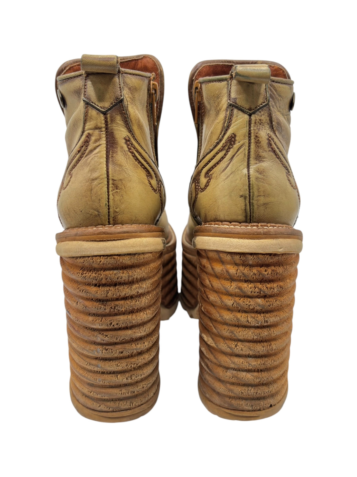 Back view of khaki brown leather platform ankle boots with stacked heel tread