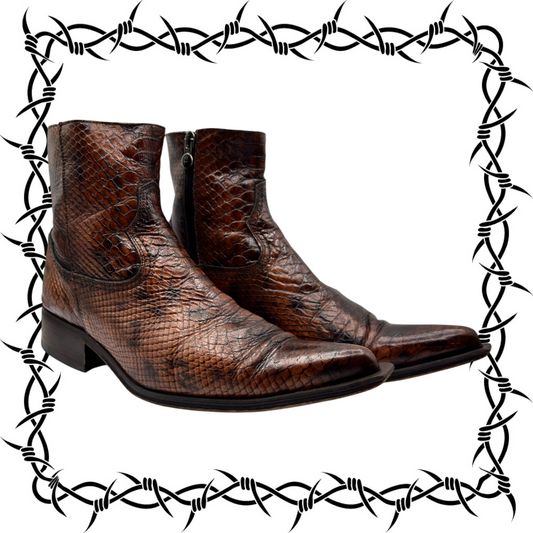 Brown snake-pattern cowboy boots with pointed toe and black pull tab detail