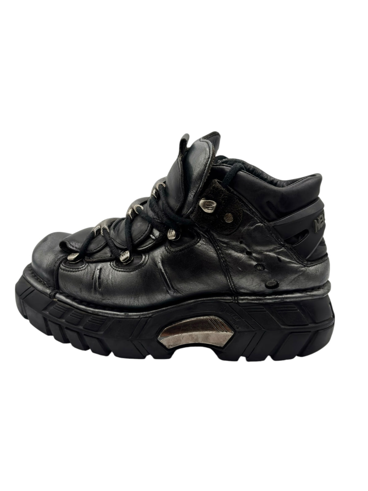 Black lace-up platform trailer boots with thick sole and side panel straps