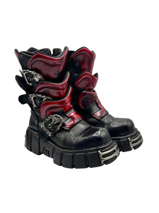 Vintage combat boots in black with red panels and chunky tread sole