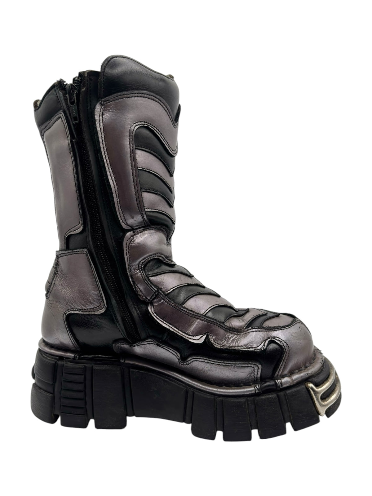 Black platform combat boots with side zipper, stitched overlays, and thick molded sole