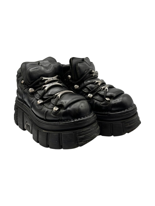 Black platform lace-up boots with chunky sole