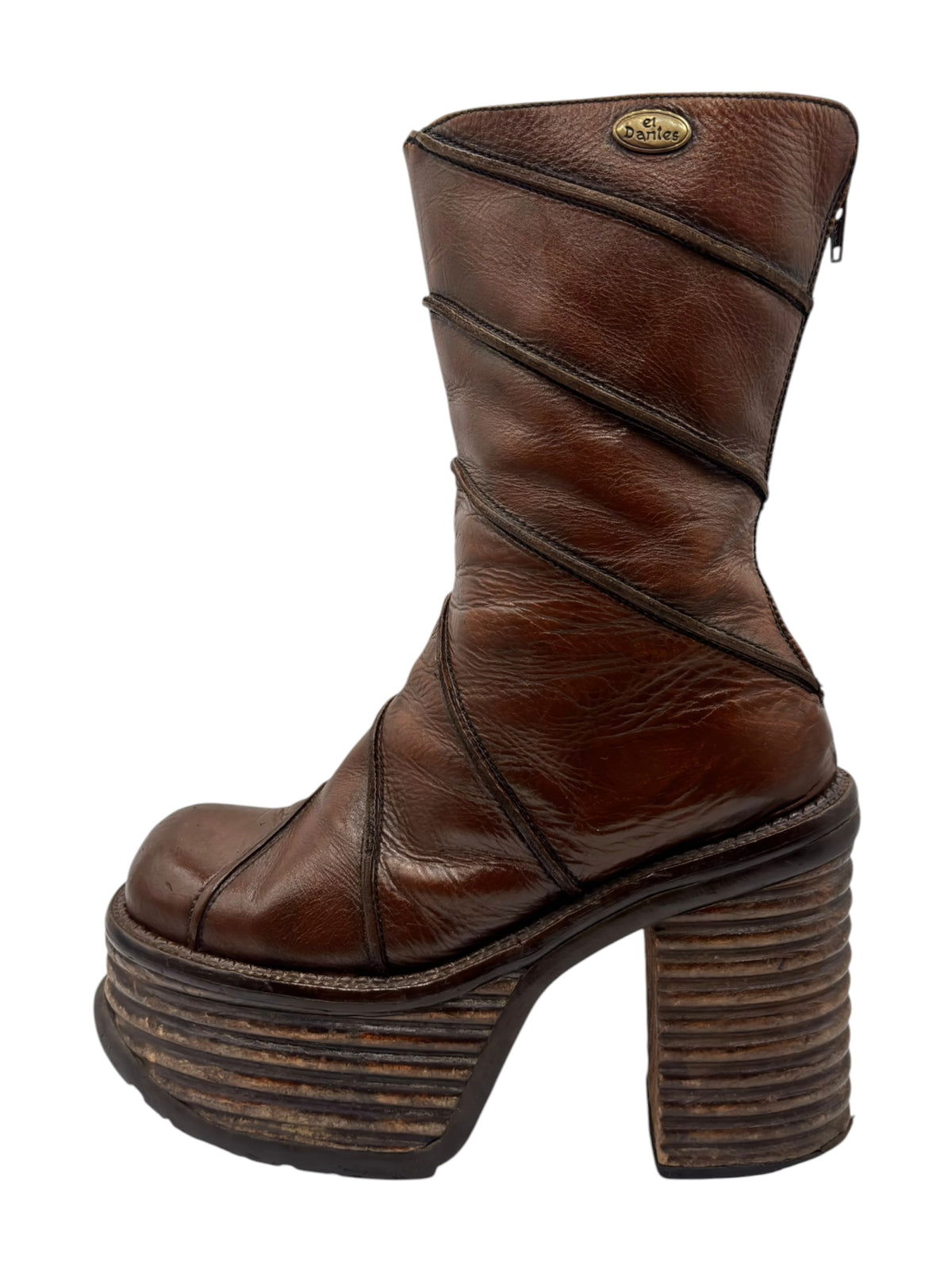 Brown mid-calf zip-up platform boots with diagonal strap detailing and stacked heel.