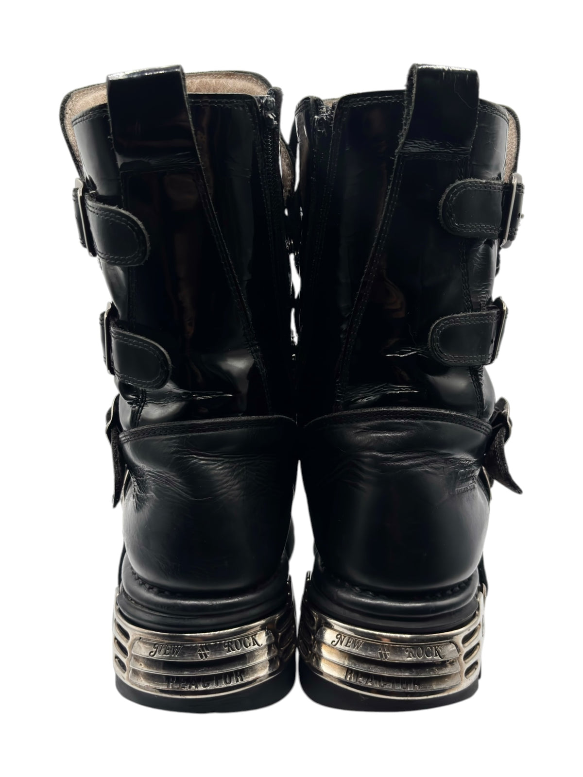 Vintage New Rock mid-calf leather boots, back view with ankle straps and tread heel