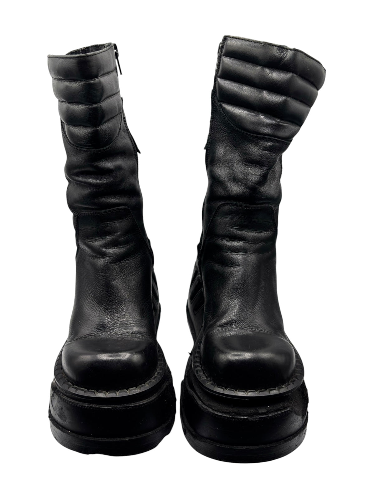 Black mid-calf leather platform boots with padded shaft and thick base sole