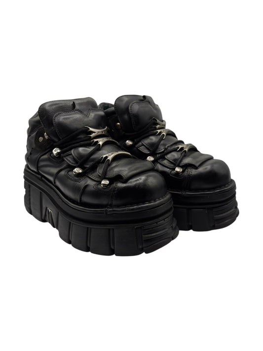 Black leather platform boots, top view showing laces and raised tread sole