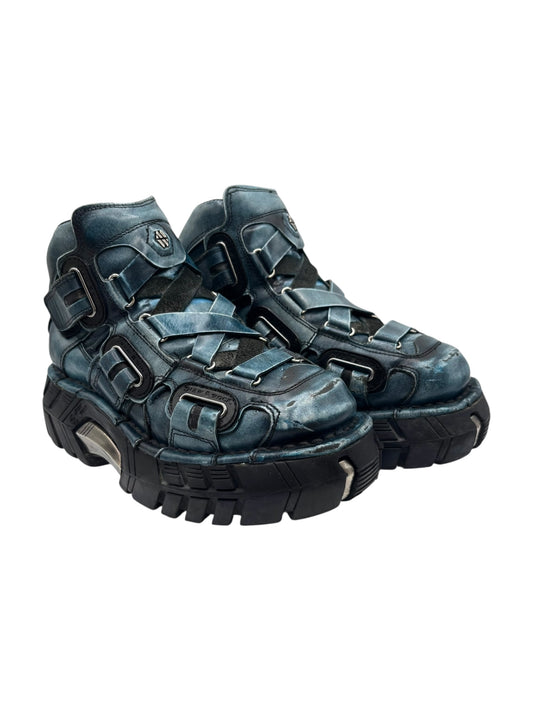 Blue techno platform boots with chunky tread and strap details