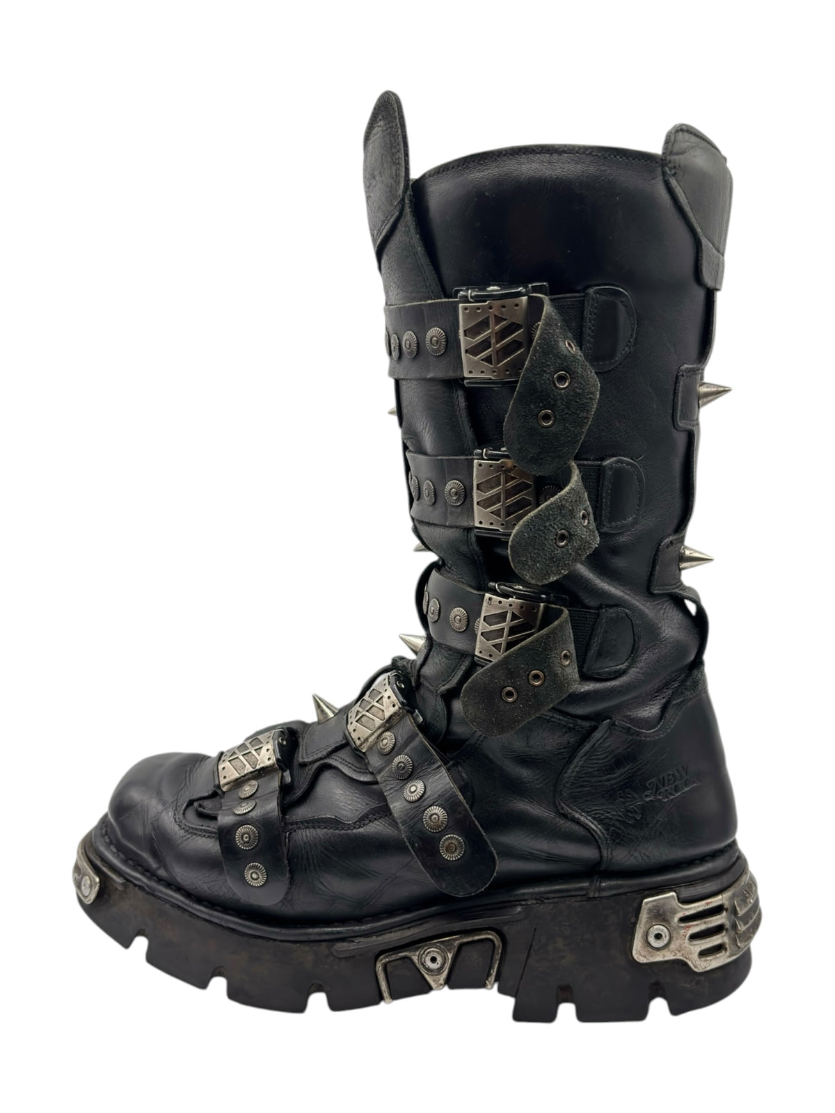 Black studded leather platform boots with multiple strap buckles and metal hardware