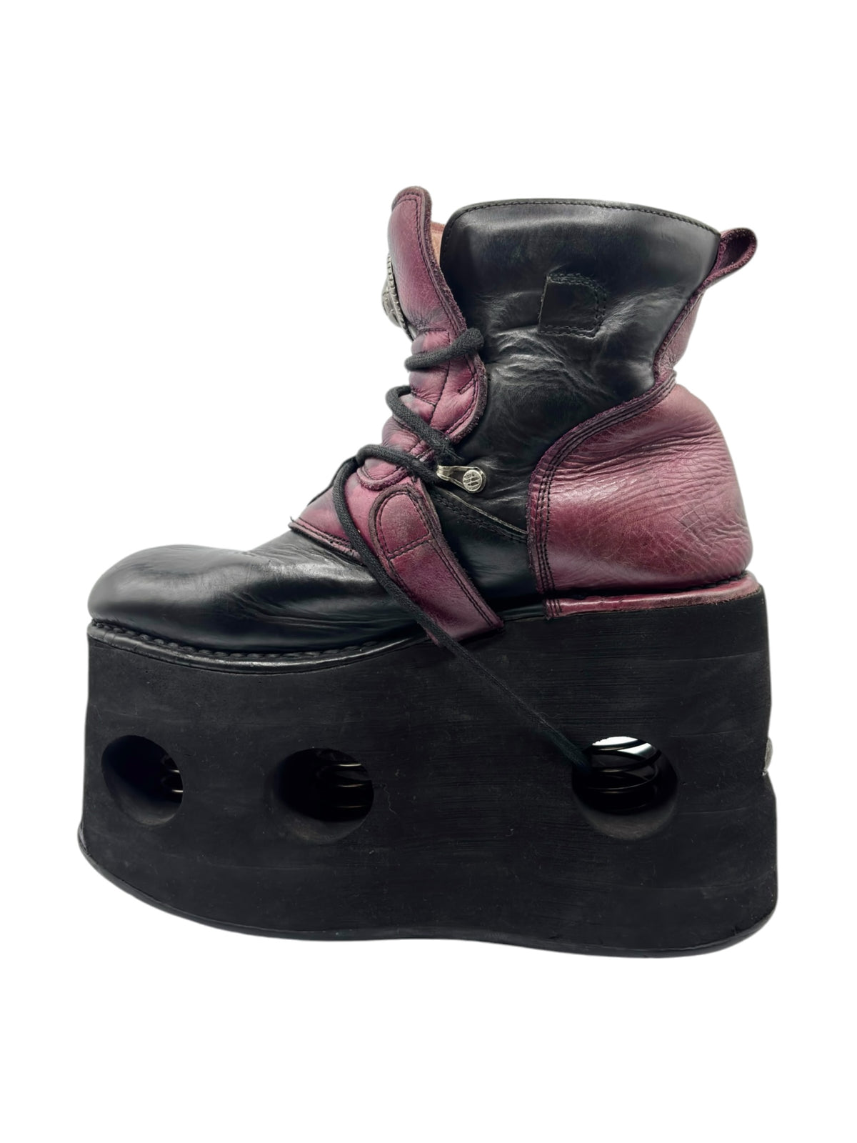 Burgundy and black high-top platform boots with lace and buckle straps