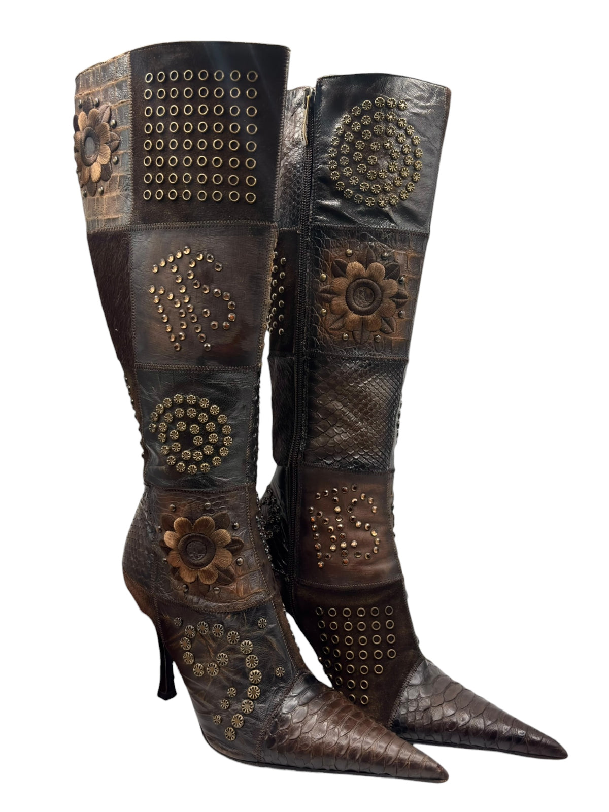 Vintage knee-high leather boots with multiple stud clusters and floral stitched appliques