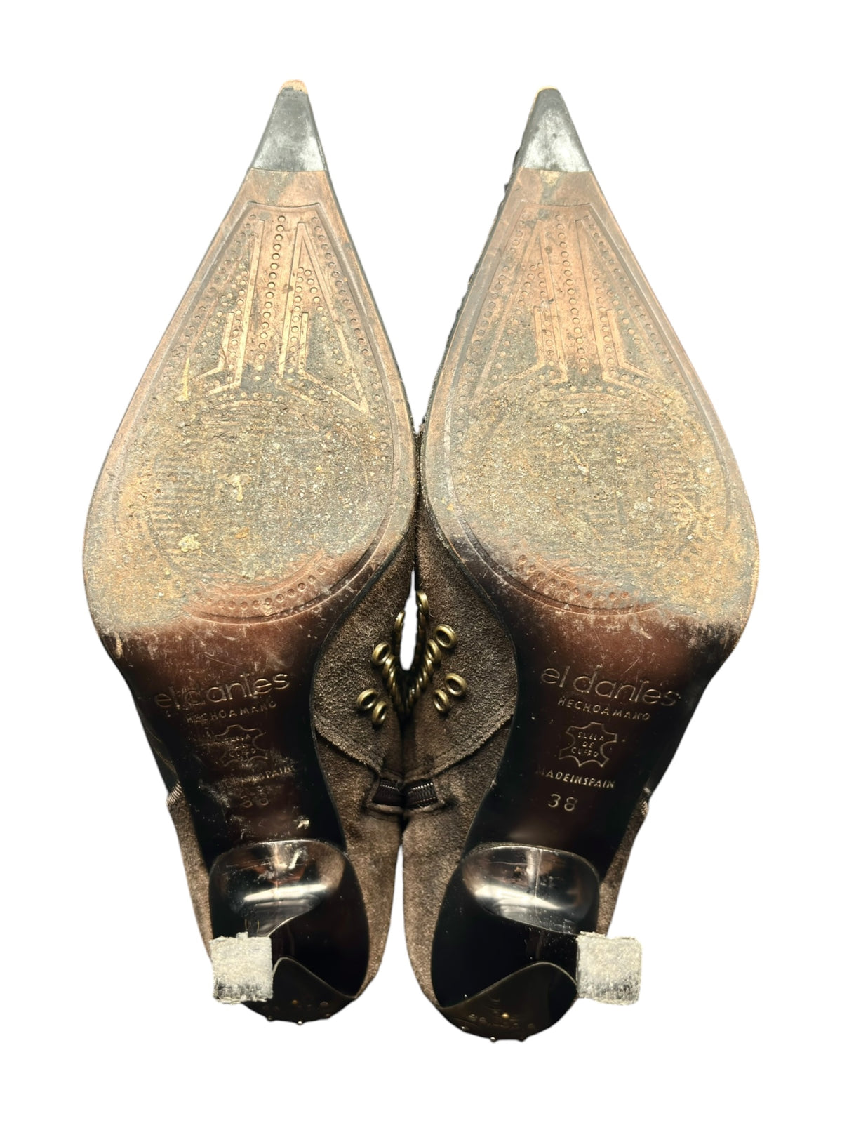 Pair of vintage knee-high leather boots in dark brown with ornate stud detailing