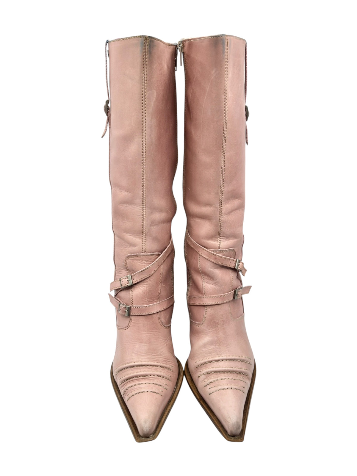 Pink leather mid-calf boots with buckled side straps and pointed toe
