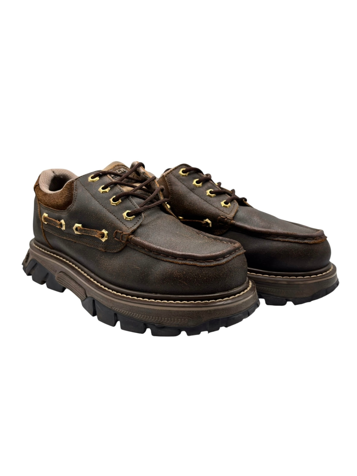 Side view of brown leather platform lace-up boots with chunky tread sole