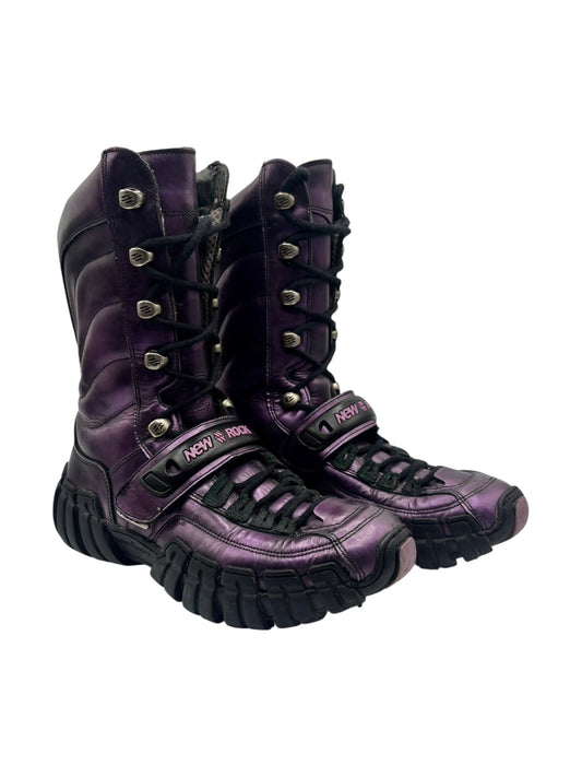 Purple high-top lace-up techno boots with thick black platform sole; New Rock logo straps