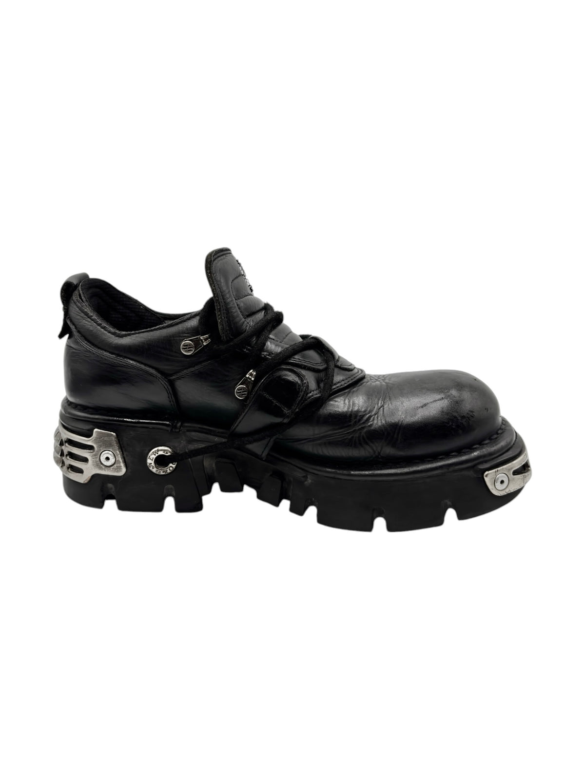 Black leather-look ankle platform boots with side buckle and lace-up straps.