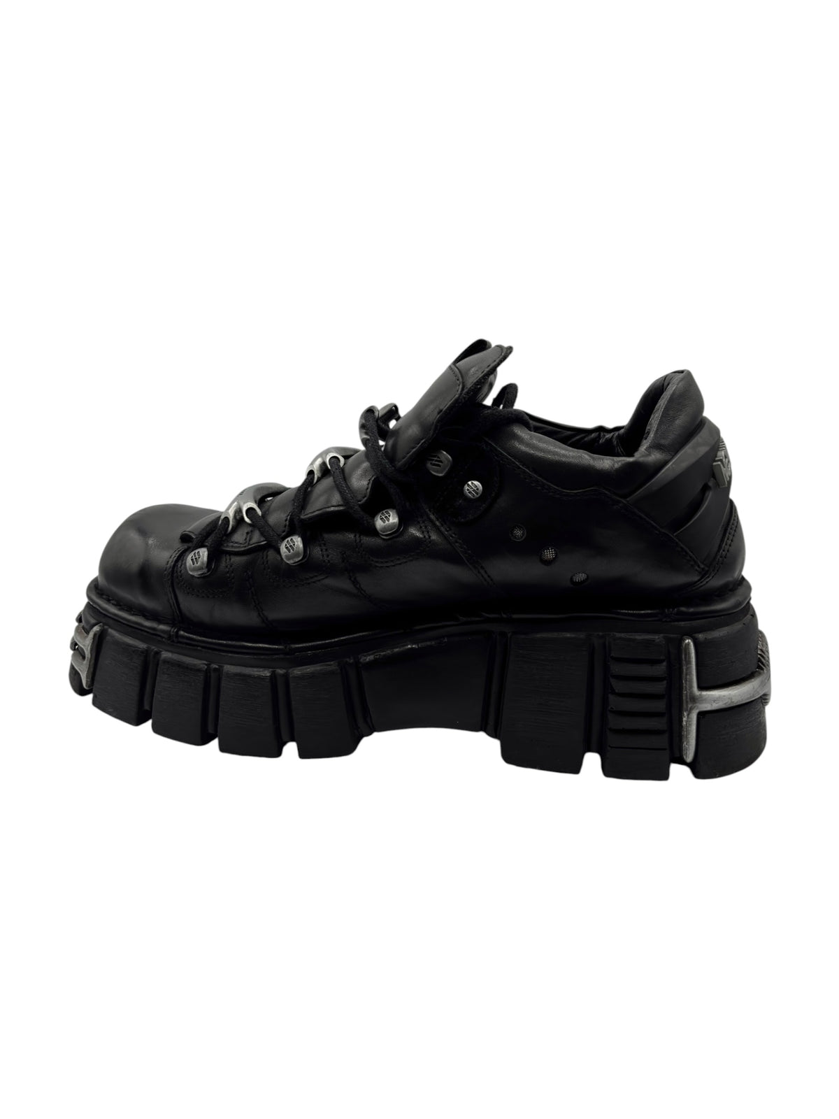 Black lace-up platform boot angled view with decorative stitch and studs