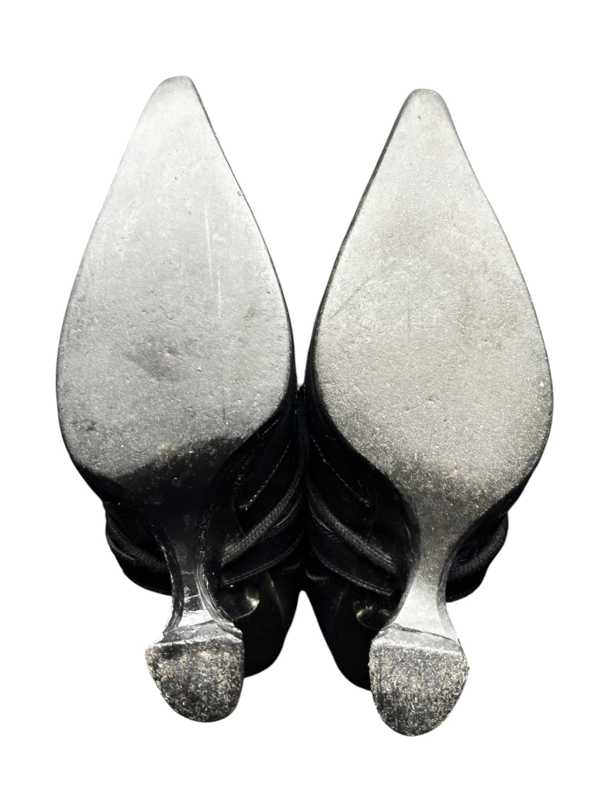 Flame-pattern cowboy boots with silver outer shafts and pointed toes