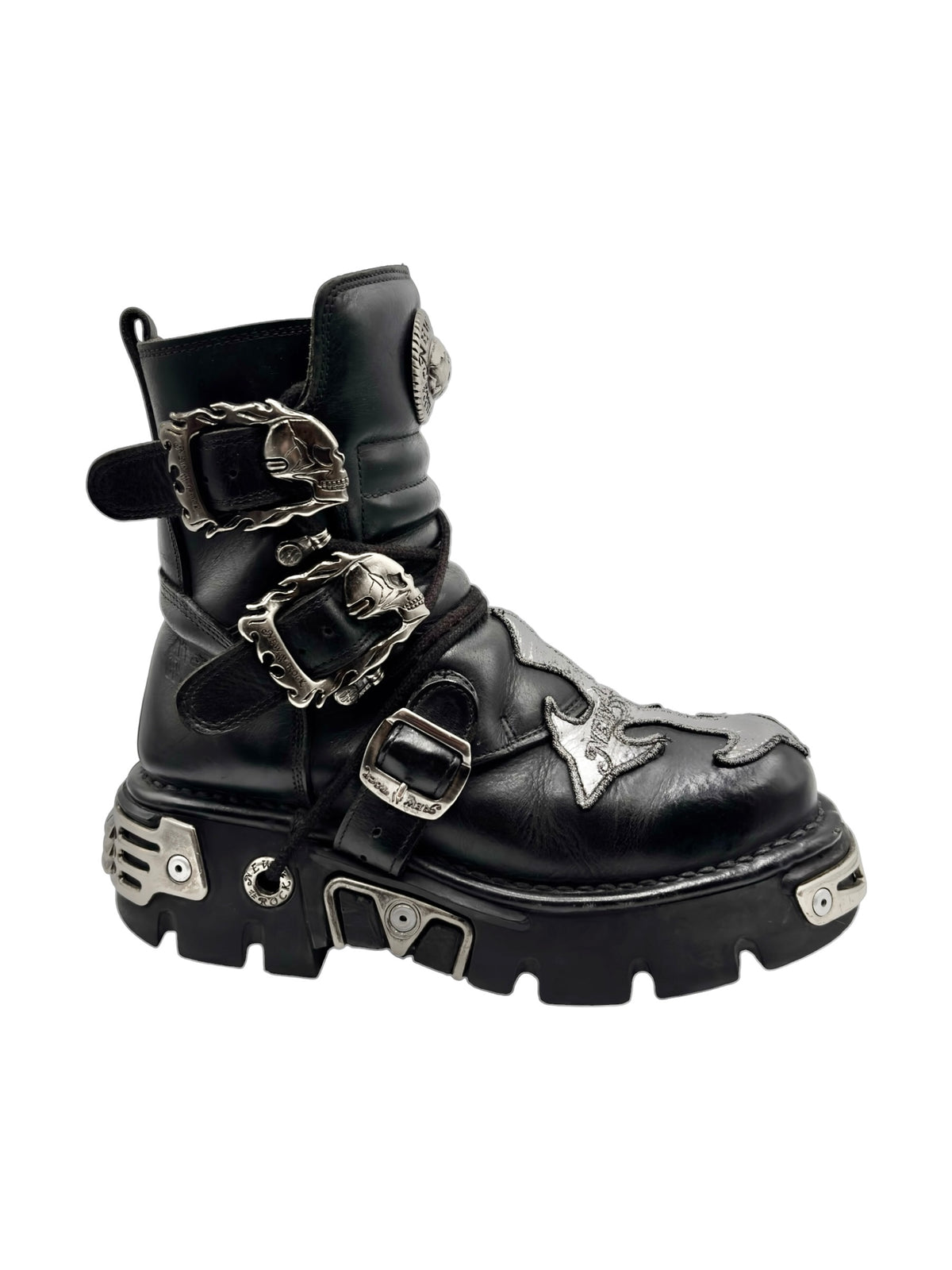 Black combat boots with straps, buckles, and silver-tone skull-shaped ornaments