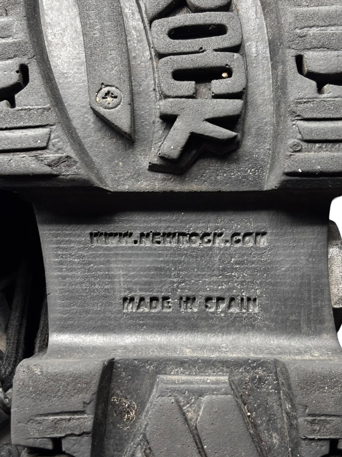 Platform boot outsole tread and branding detail on rubber sole.