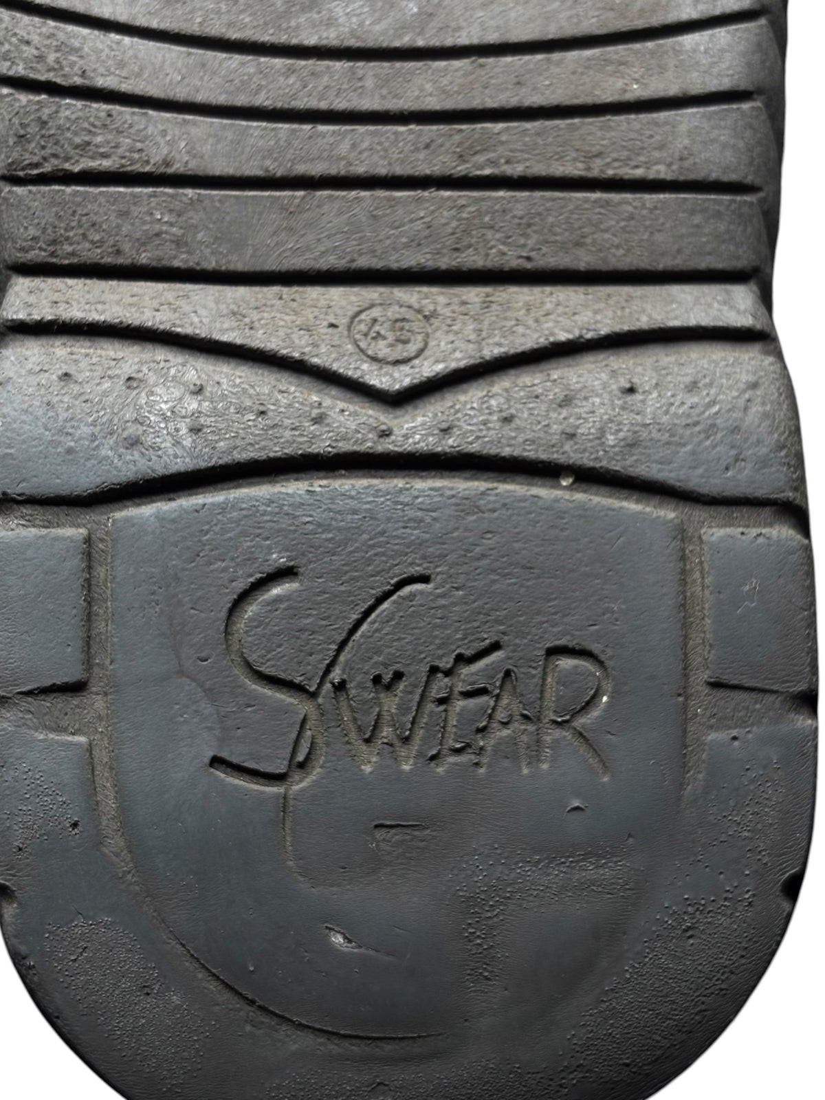 Vintage Swear London platform boots outsole tread with “SWER” logo and grooves