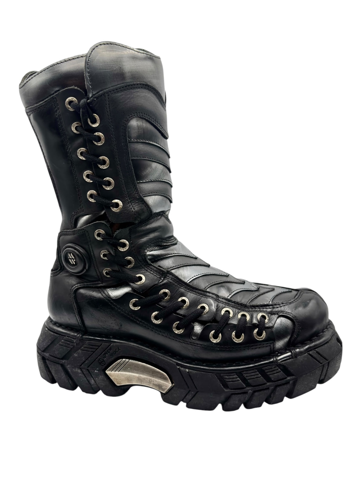 Black lace-up tall boots with padded collar and chunky tread platform outsole