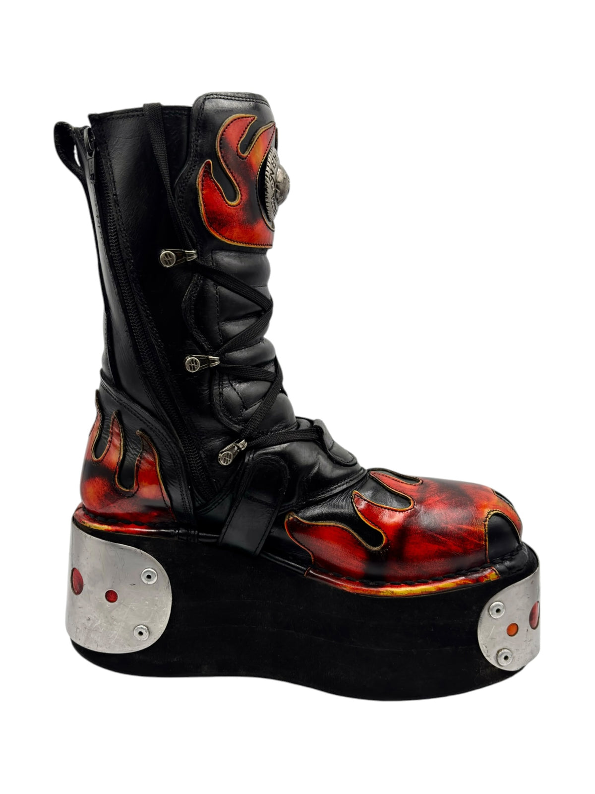 Black flame platform boot with stacked sole, side straps, and red-orange flame toe panel.