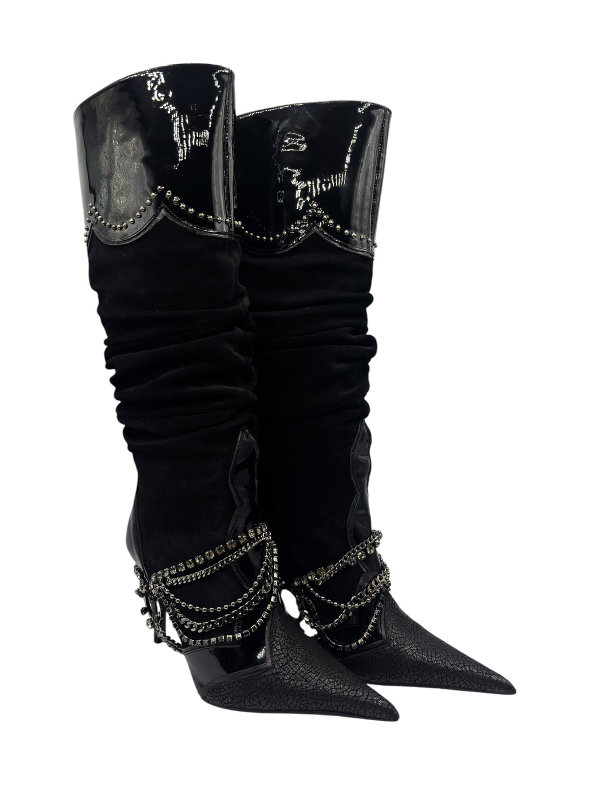 Angled view of black knee-high boots with ruched leg and rhinestone chain adornment